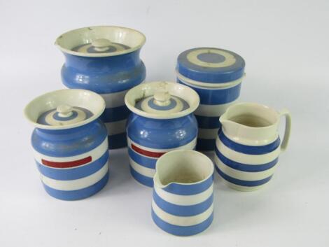 Four T G Green Cornishware blue banded storage jars and covers