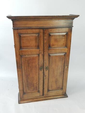 A Continental 18thC oak cupboard