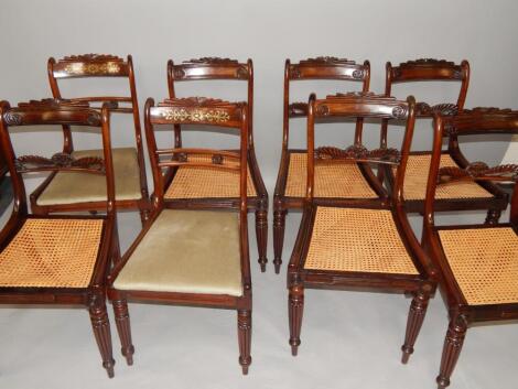 A Regency harlequin set of eight rosewood and mahogany single dining chairs