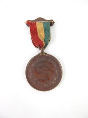 A Royal Naval Lifeboat Institution bronze medal awarded to James Stubbs - 8