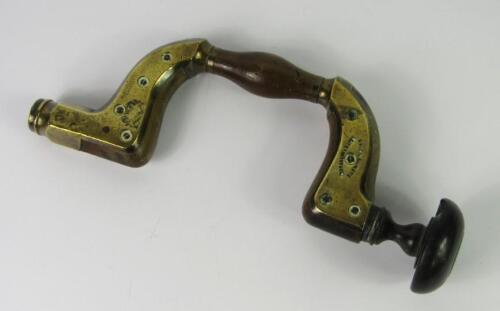 A Wingfield & Co 19thC hardwood and brass brace