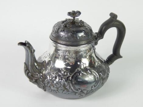 A Victorian silver tea pot