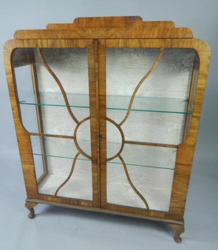 An Art Deco walnut sunburst display cabinet