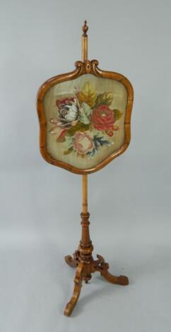 A Victorian walnut pole screen