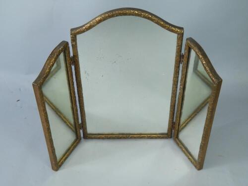 An early 20thC giltwood and Gesso triptych dressing table mirror.