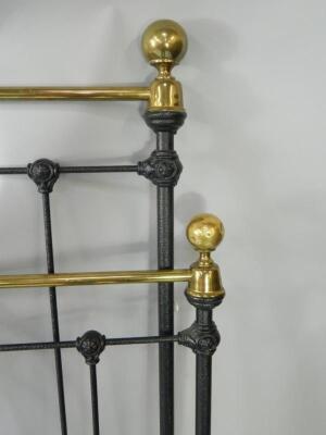 A Victorian style brass and cast iron double bed. - 2