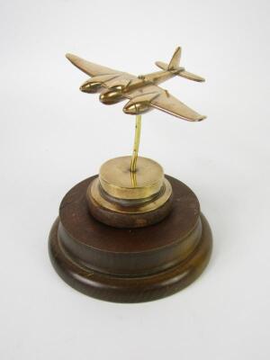 A brass model of a Mosquito aeroplane