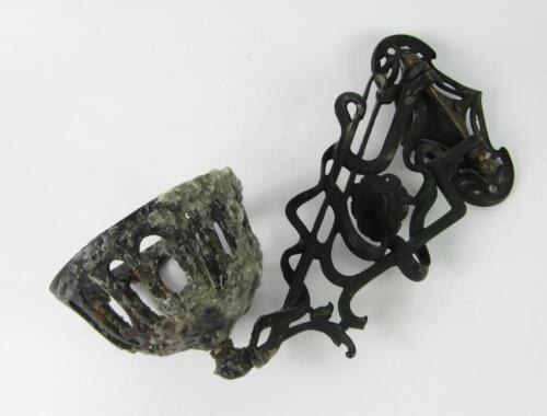 An Art Nouveau cast iron wall bracket oil lamp holder