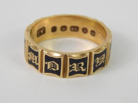 An 18ct gold memorial ring