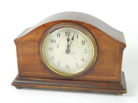 An Edwardian mahogany and boxwood line inlaid mantel clock