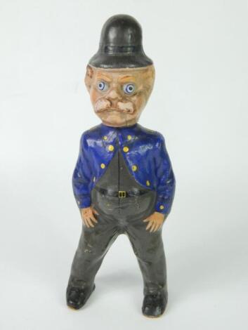 A Victorian papier mache figure of a policeman