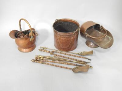 A copper log basket