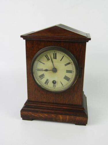 A Victorian oak cased mantel clock of architectural form