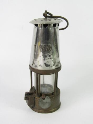 An MEP brass and white metal lantern