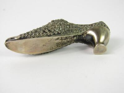 A silver pin cushion modelled as a lady's shoe - 2