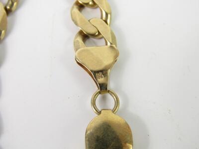 A 9ct gold curb link bracelet on a snap clasp - 2