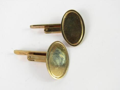 A pair of 9ct gold oval swivel link cufflinks