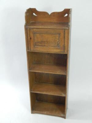 An early 20thC narrow oak student's bookcase