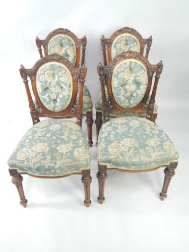 A set of four Victorian walnut single dining chairs