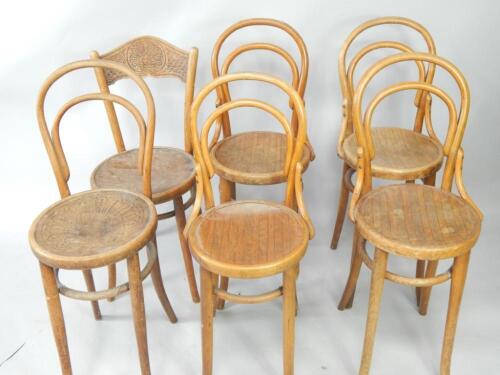 A set of four Mundus and Kohn bentwood hoop back chairs