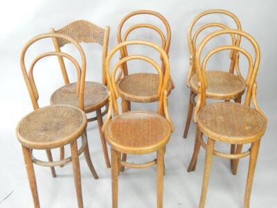 A set of four Mundus and Kohn bentwood hoop back chairs