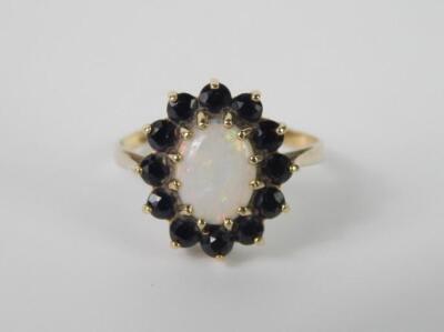 A 9ct gold opalet and sapphire ring