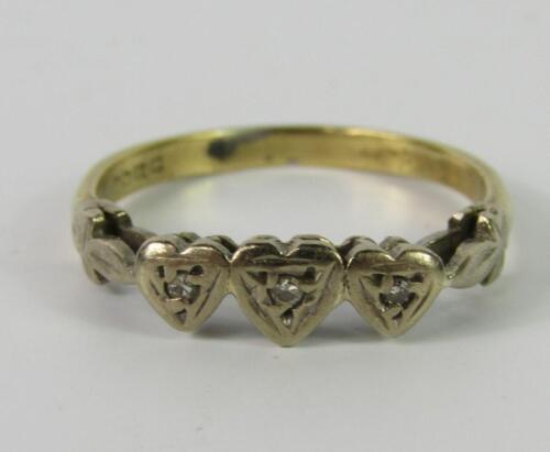 An 18ct gold platinum and diamond three stone ring