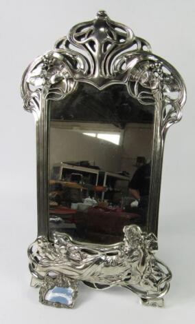 An Art Nouveau style white metal strut mirror