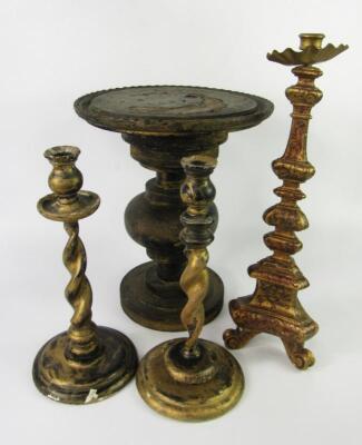 A Continental 19thC and later giltwood candlestick