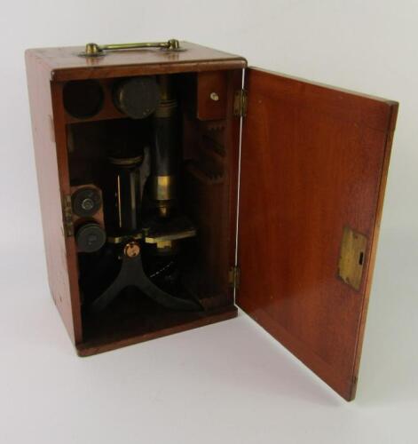 A Swift & Son early 20thC brass microscope
