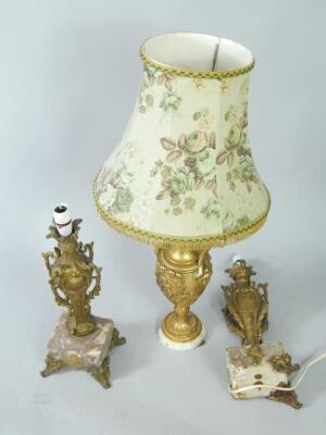 A gilt wood and white marble table lamp