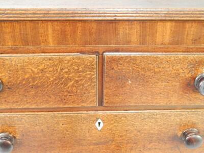 A Georgian oak and mahogany chest of drawers - 4