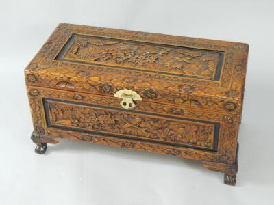 A camphorwood chest of small proportions