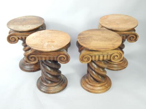 A set of four Doric Capital stools