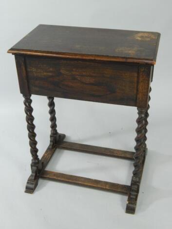 An early 20thC oak lady's writing desk