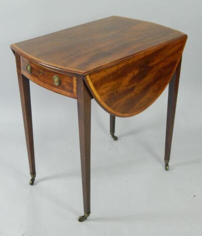 An Edwardian mahogany and satinwood cross banded Pembroke table