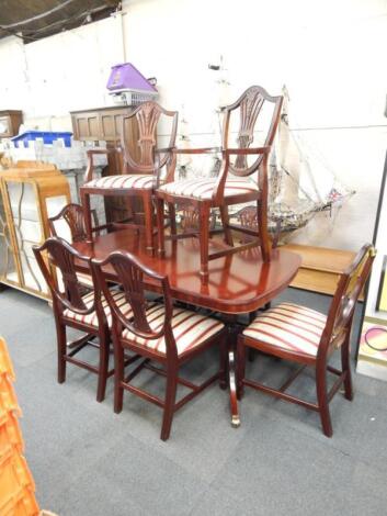 A Stag mahogany regency style twin pedestal dining table