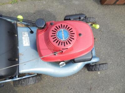 A Honda ISY Easystart petrol lawn mower. - 2