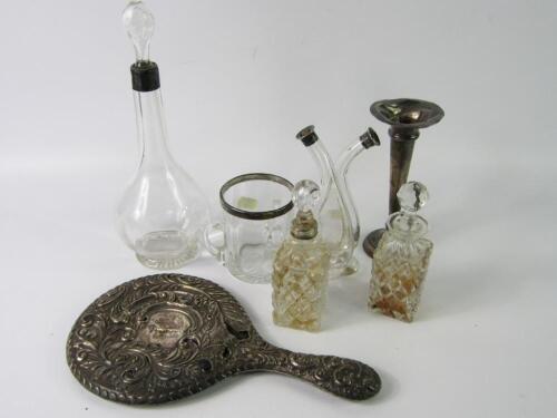 An Edward VII cut glass conjoined oil and vinegar bottle