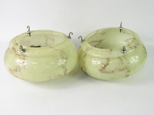 A pair of 1940's yellow marbled glass ceiling lights