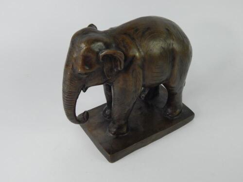 A loaded bronze sculpture of an elephant