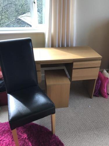 An IKEA dressing table and stool