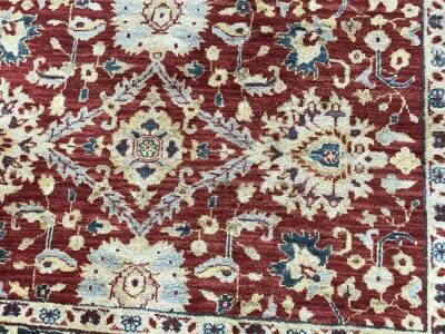 A red ground Persian design rug - 2