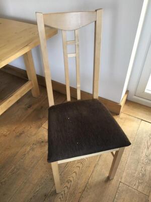 A set of eight IKEA dining chairs.