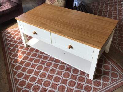 A pine top and painted two drawer coffee table.