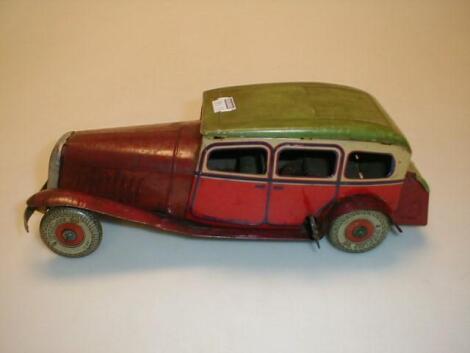 A tinplate clockwork motor car