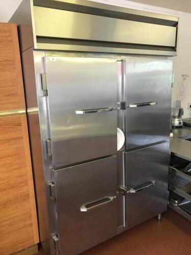 A steel stainless steel four drawer chiller cabinet.