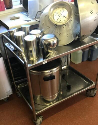 A stainless steel tea trolley.