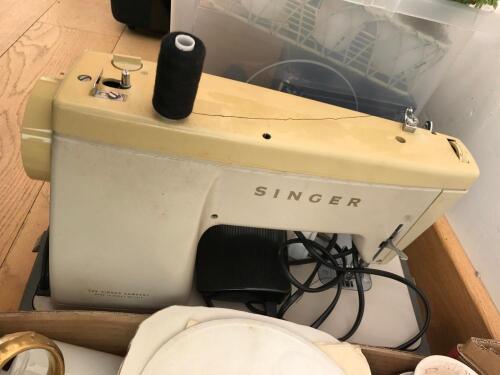 A cased electric Singer sewing machine