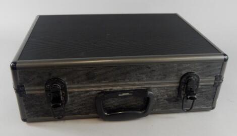 An aluminium and black metal camera case.